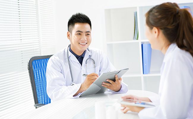 Two doctors discussing a case. 