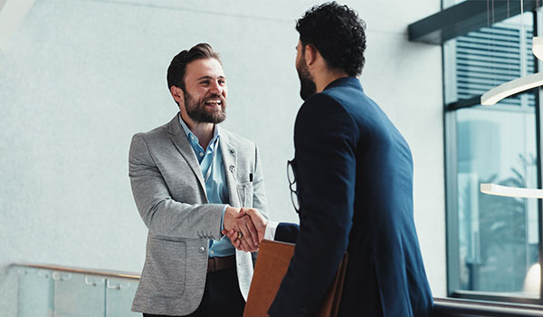 Two men handshaking